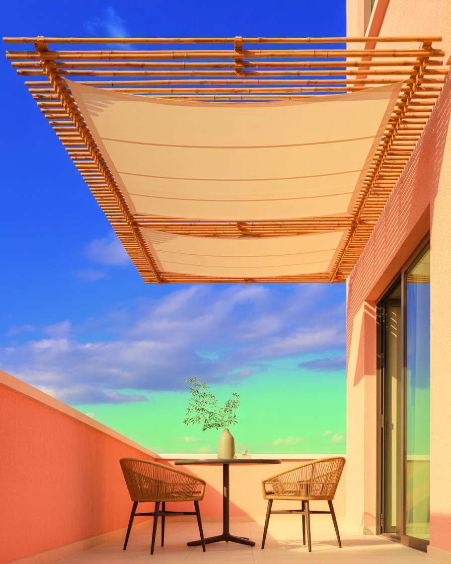 Custom-made shade structure on an apartment balcony providing a unique and tailored outdoor experience