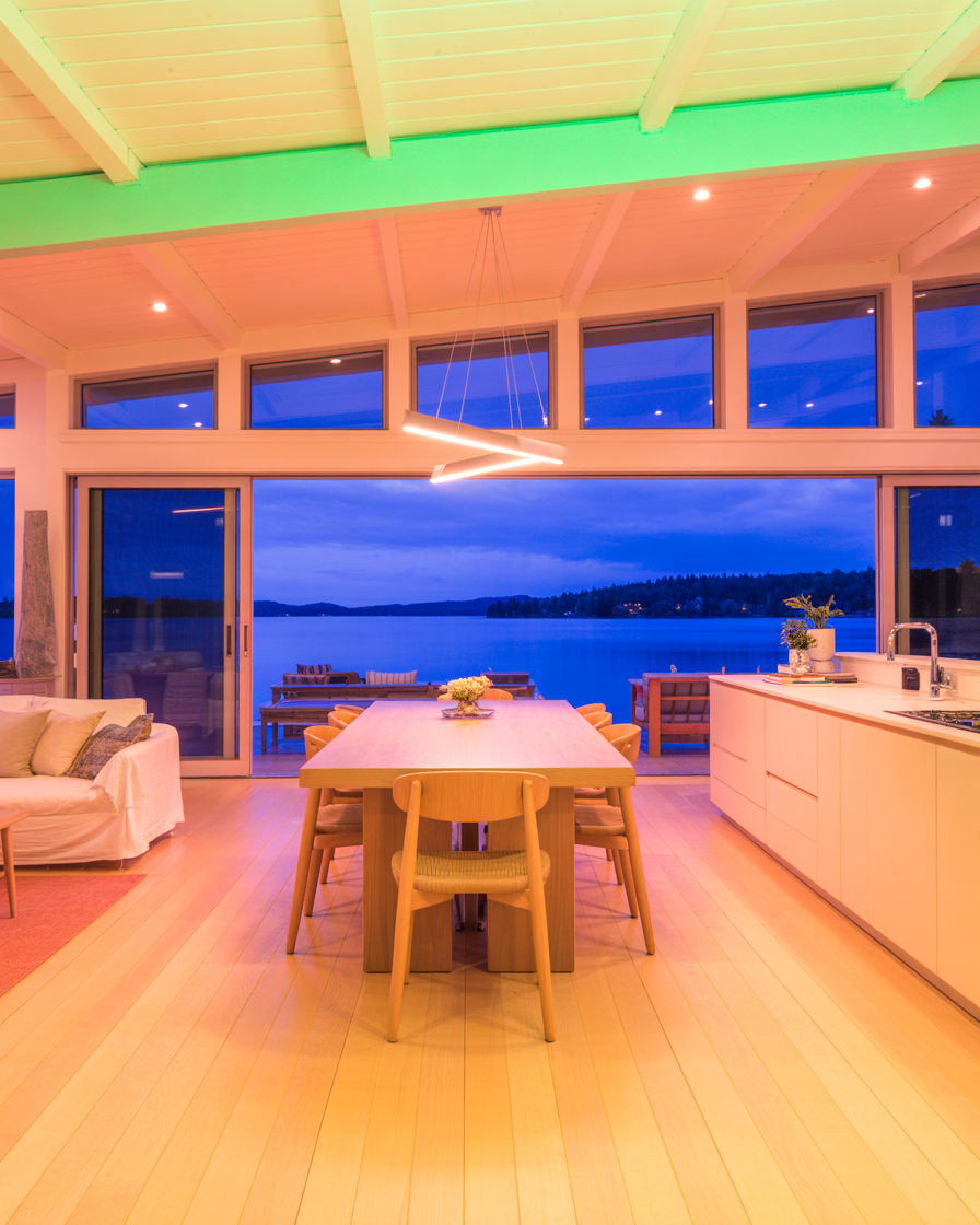 Open-concept lake house with neutral tones and seamless flow between living and kitchen