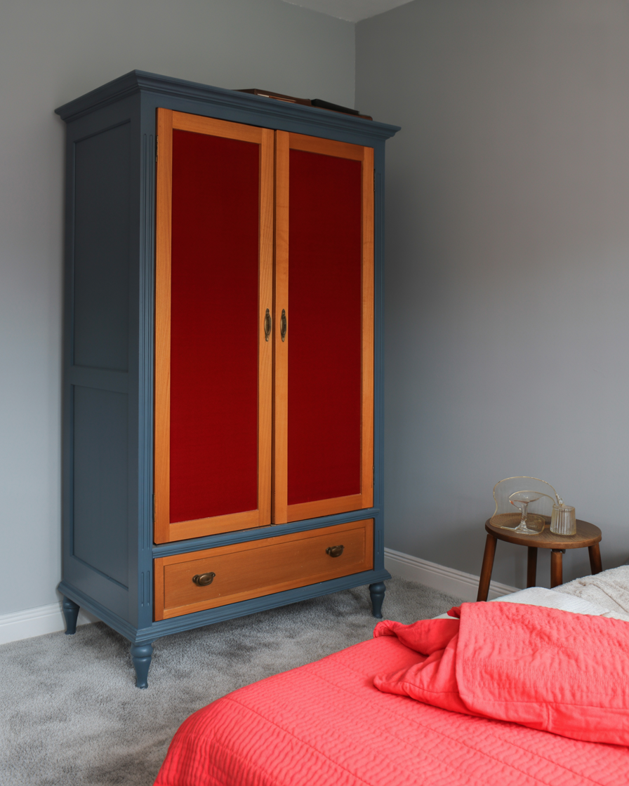 Two-tone painted wardrobe in navy and wood finish