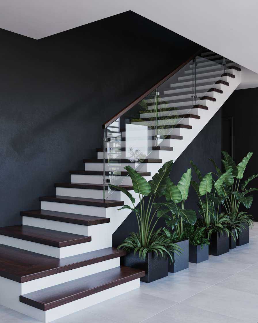 Black and white staircase with tropical plants.
